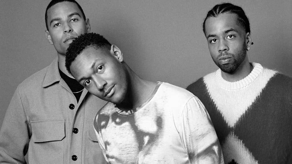 Black and white shot of the three members of Somatic Rituals looking directly at the camera.